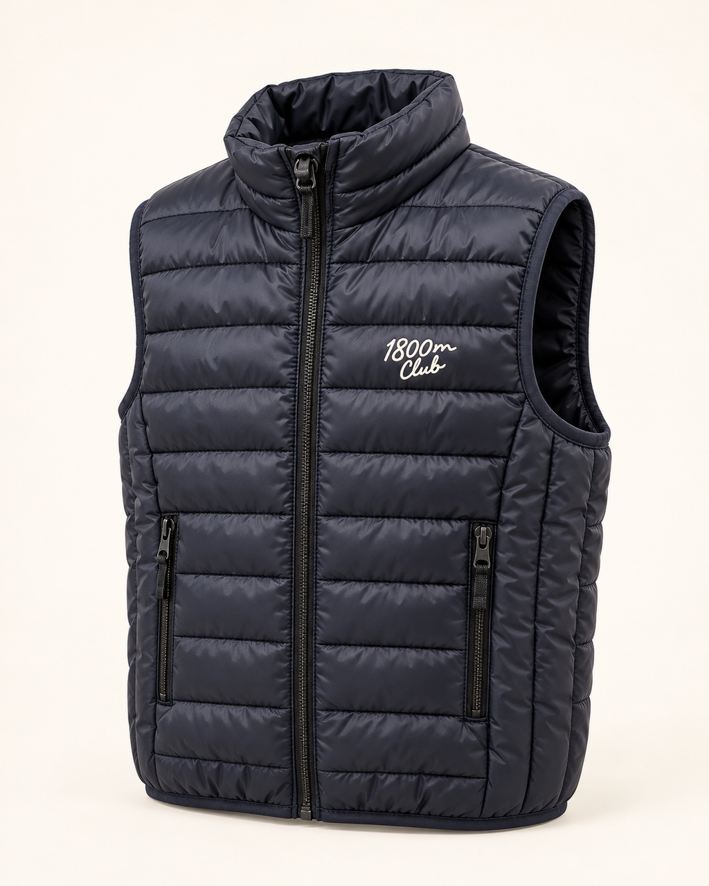 Three-quarter studio product image of the 1800m Club French Navy kids padded vest