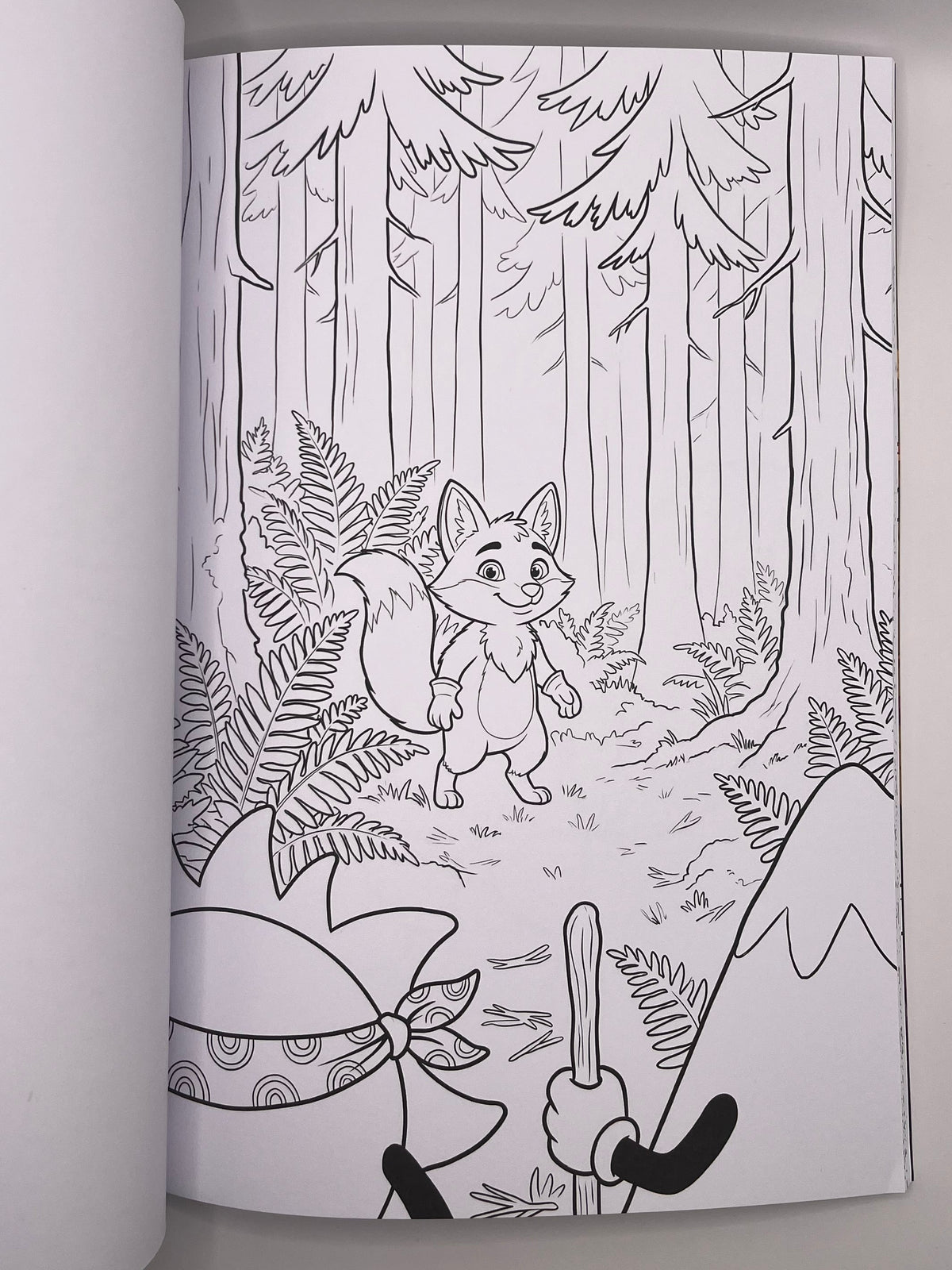 Colouring page with a fox in the forest and Ray and Monty in the foreground