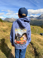 Back of the blue Ray & Monty Road Trip kids' hoodie, showing the large Alpine road-trip illustration on a mountain path.